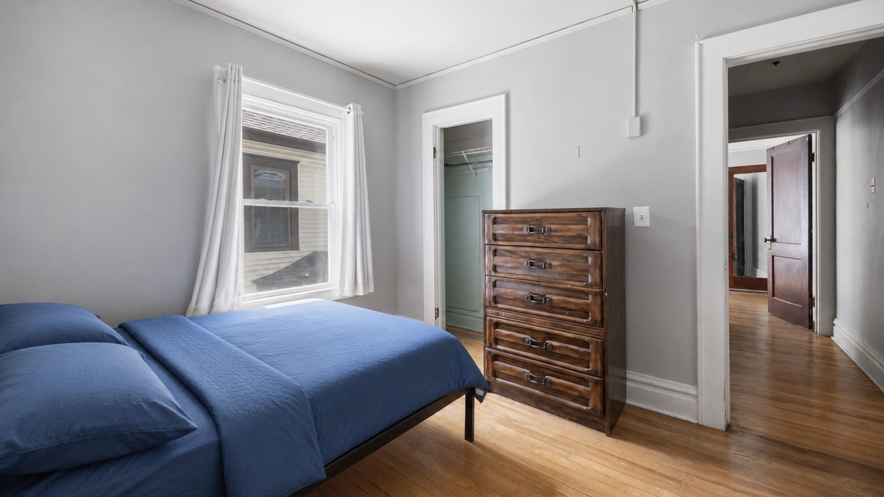 825 Ackerman Avenue - bedroom with dresser and closet